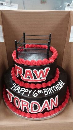 a birthday cake in the shape of a boxing ring