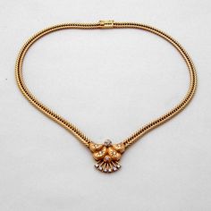 "Vintage 14 K (.585) yellow gold thick chain collar necklace with an ornate centerpiece, decorated with 0.6 Ct. Diamonds. This stately necklace is 17\" long, the chain is 5.3 mm wide, the centerpiece is 1\" at the widest, total weight is 40.4 grams or 1.3 ozs Troy. EA1938" Vintage Gold Diamond Necklaces, Elegant Gold Diamond Necklace With Curb Chain, Vintage Gold Diamond Necklace For Formal Occasions, Vintage Gold Diamond Necklace, Elegant Wedding Necklaces With Curb Chain, Gold Diamond Necklace With Jewels For Anniversary, Diamond Chain Necklace, Chain Collar, Antique Jewelry Necklace