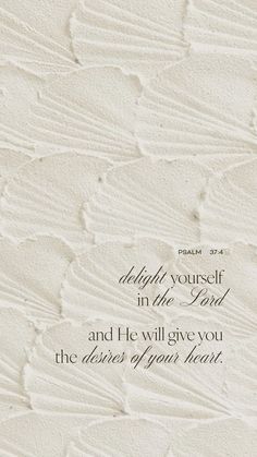 a white wall with a bible verse written on the bottom and an image of clouds above it