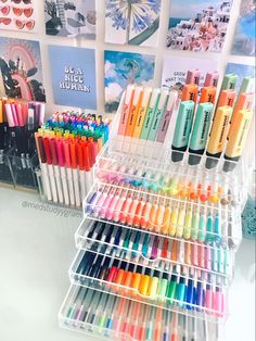 the display case is full of markers and pens