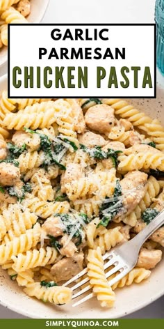 garlic parmesan chicken pasta in a white bowl with a fork