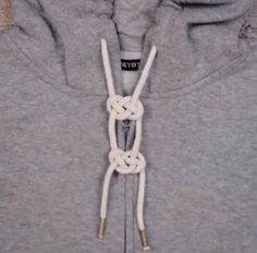 the hoodie is tied up and ready to be worn