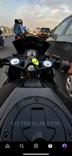 a person riding on the back of a motorcycle