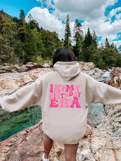 "In My Birthday Era Hoodie, Girls Birthday Hoodie, Retro Birthday Girl Hoodie, Birthday Party Hoodie, Cute Girls Birthday Hoodie 💖Youth Hoodies do not have drawcord for added safety!💖 Material: 50% cotton, 50% polyester for a comfortable and durable blend. Fabric: Medium-heavy (8.0 oz/yd² or 271.25 g/m²) for warmth on cooler days. Fit: Loose fit for comfort without sacrificing style. Label: Sewn-in for a seamless feel. Sizing: Check our sizing chart for the right fit. HOW TO PLACE YOUR ORDER R Pink Long Sleeve Sweatshirt For Birthday, Pink Long Sleeve Birthday Sweatshirt, Pink Long Sleeve Sweatshirt For Birthdays, Birthday Long Sleeve Hoodie With Letter Print, Long Sleeve Hoodie With Letter Print For Birthday, Birthday Letter Print Long Sleeve Hoodie, Winter Birthday Hoodie With Letter Print, Hooded Letter Print Sweatshirt For Birthday, Hooded Sweatshirt With Letter Print For Birthday