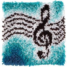 a blue and white rug with an image of a bird on it