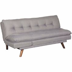 a gray couch sitting on top of a wooden frame