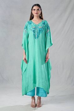 Sea green kaftan with resham, zardozi embroidery in floral pattern on neckline. Paired with matching inner and sea blue pant. - Aza Fashions Anarkali Kaftan With Embroidered Neckline, Green Floor-length Kaftan With Zari Work, Green Resham Embroidered Kaftan For Spring, Green Chikankari Embroidery Kaftan For Spring, Bohemian Sets With Embroidered Neckline For Festive Season, Bohemian Sets With Embroidered Neckline For Festive Events, Bohemian Festive Sets With Embroidered Neckline, Green Floor-length Kaftan With Dabka Work, Anarkali Kaftan With Embroidered Neckline For Eid