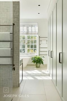 the bathroom is clean and ready to be used as a storage area for towels or other items