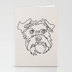 a card with a dog's face drawn in black ink on white cardstock