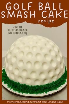 a golf ball cake on a plate with green grass around it and the words, golf ball smash cake recipe