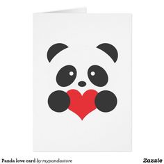 a panda bear holding a heart in its paws