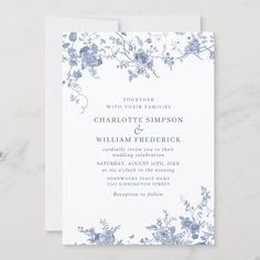 a wedding card with blue flowers on it