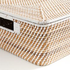 a wicker basket is shown on a white surface