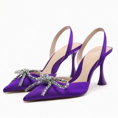 Zara Rhinestone Bow Slingback Heels In Purple Brand New With Tags. Price Is Firm. Size 36 & 37 Are Available. Heeled Slingback Shoes. Embellished Bow Detail On The Front. Pointed Toe. Strap At The Back. The Same In Pink & Blue Are Available As Well (Last Pics). Heel Height: About 10 Cm / 3.9″ Airfit. Flexible Technical Latex Foam Insole, Designed To Offer Greater Comfort. Upper: 100% Polyester Lining: 100% Goat Leather Sole: 100% Polyurethane Thermoplastic Insole: 85% Goat Leather / 15% Polyeste Black High Heel Pumps, Zara Heels, Slingback Heels, Bow Heels, Rhinestone Bow, Slingback Shoes, Slingbacks, Goat Leather, Slingback Heel