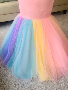 This Custom Pink Wedding Dress is for our bride, Kelli. It features a baby pink mermaid bodice with a rainbow skirt which has mutli layers of colored tulle. This is perfect for a beach wedding, or a wedding filled with tropical vibes. If you a custom design in mind, contact Brides & Tailor first. Follow us on Instagram! @bridesandtailor www.bridesandtailor.com Custom Wedding Dress Sketch, Rainbow Wedding Dress, Alternative Wedding Dress, Wedding Dress Sketches, Colored Wedding Dress, Rainbow Skirt, Ivory Gown, Barbie Bride, Alternative Wedding Dresses