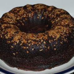 a chocolate bundt cake on a white plate