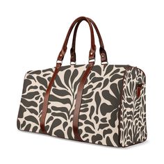 Hey there! I’m the Floral Duffel Bag, Brown Annua, your perfect companion for any adventure. Imagine walking through the airport or heading to the gym with me by your side, turning heads with my chic floral design. I’m not just about looks, though; I’ve got plenty of room for all your essentials and a few extras too. Let’s explore the world together in style!  Why you'll love me:    Stylish and practical : Beautiful floral design in regal brown and cream.   Spacious : Plenty of room for everything you need.   Durable and water-resistant : Ready for any adventure, rain or shine.   About me | Floral Duffel Bag, Brown Annua Hi! I’m the Floral Duffel Bag, Brown Annua. With my elegant design and practical features, I’m here to make your travels easier and more stylish. Whether you’re off on a f Womens Weekender Bag, Floral Bucket Hat, Grocery Tote Bag, Floral Handbags, Grocery Tote, Weekend Bag, Bag Collection, Rain Or Shine, Floral Accessories