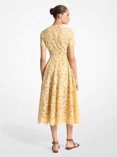 Made from floral lace, this fit-and-flare dress epitomizes eternal elegance. The cap-sleeve silhouette is fully lined in silk for opacity and descends to a scalloped hemline. Style it with crocodile-embossed leather extras for a modern play on texture. Formal Fit And Flare Lace Dress, Fitted Classic Lace Dress, Classic Fitted Lace Dress, Elegant Cap Sleeve Dress With Lace Trim, Luxury Lace Dress For Spring, Fitted Cap Sleeve Lace Dress, Fitted Lace Dress With Cap Sleeves, Cap Sleeve Fitted Lace Dress, Luxury Fitted Lace Dress For Spring