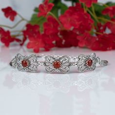 Carnelian 925 Sterling Silver Floral Bracelet, Artisan Handmade Filigree Dainty Bracelet, Women Jewelry, wedding gift, unique gift, gothic bracelet, mothers day gift Material: 925 Sterling Silver ( NICKEL FREE ) Gemstone: Carnelian 6 mm. Bracelet Length: 18cm + 5cm // 7 Inches + 2 Inches Extender Bracelet Width  : 1.5 cm / 0.6 Inches This dainty link bracelet add a bold fashion statement to any look with Carnelian and Flower design. The handcrafted designs that make a beautiful fashion statement. This vintage, original, and stylish luxury jewelry is perfect for wearing at parties, festivals and everyday life. FREE, FAST AND TRACKABLE SHIPPING FOR ALL EU COUNTRIES AND USA. COMES WİTH VELVET POUCH AND LUXURY GİFT BOX. This handmade silver filigree bracelet is the perfect gift for a mom, wife Gothic Bracelet, Filigree Bracelet, Art Butterfly, Silver Link Bracelet, Filigree Jewelry, Floral Bracelet, Dainty Bracelet, Butterfly Bracelet, Bracelet Women