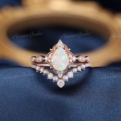 Vintage Opal Bridal Set Rose Gold Pearl Diamond Curved Band Opal Wedding Rings 2PCS Engagement Ring Set Delicate Promise Ring Women Jewelry Information: ♡ Handmade, high-quality item ♡ Material: SOLID 14K/18K GOLD ( can be made in yellow/white/rose gold ) ♡ Center stone: Natural Australian opal ♡ Size/Weight: 8x6mm ♡ Cut - Pear Shaped ♡ Color: White opal with fire ♡ Side stones: Moissanite ♡ Weight: About 0.16ct ♡ Cut - Round Shaped Or natural diamonds ♡ Weight: About 0.16ct ♡ Clarity - SI-VS ♡ Delicate Opal Wedding Ring, White Heirloom Jewelry For Wedding, Heirloom White Wedding Jewelry, White Opal Ring For Wedding, Rose Gold Wedding Ring Jewelry, Heirloom Rose Gold Jewelry For Wedding, Heirloom Rose Gold Wedding Jewelry, White Gold Opal Wedding Ring, Heirloom White Gold Opal Ring For Wedding