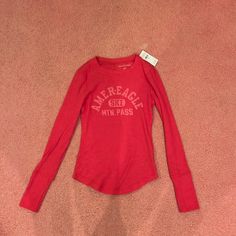 Nwt American Eagle Red Long Sleeve Shirt - Size S Fitted Red T-shirt For Fall, Red Fitted Long Sleeve T-shirt, Casual Red T-shirt For Fall, Red Stretch T-shirt For Fall, University Red Long Sleeve Tops For Winter, University Red Cotton Top For Fall, Red Stretch Long Sleeve Shirt, Casual Red Tops For Fall, University Red Long Sleeve Casual T-shirt