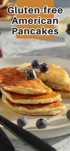 pancakes on a plate with blueberries and syrup in the background text reads gluten - free american pancakes