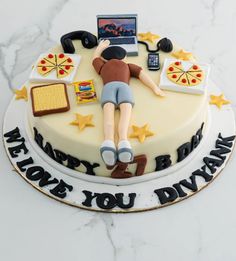 a birthday cake with a person laying on it