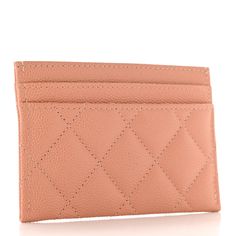 This is an authentic CHANEL Caviar Metal Perforated Quilted CC Card Holder in Beige. This fashionable card case is crafted of pebbled caviar leather in coral pink. It features a perforated gold Chanel CC logo on the front and opens to a pink fabric interior. Cc Card, Gold Chanel, Chanel Wallet, Chanel Caviar, Beige Fabric, Dark Beige, Card Holder Wallet, Cc Logo, Pink Fabric