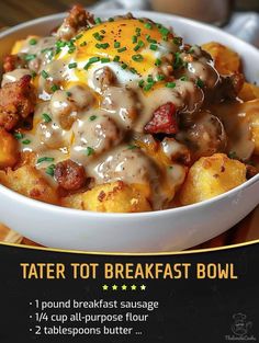 a bowl filled with tater tots covered in gravy and topped with an egg