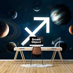 a desk with a computer on it in front of planets and the word smart object