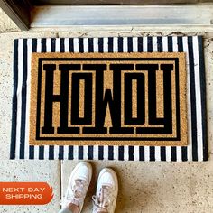 someone is standing in front of a door mat with the wordhow on it and shoes next to it