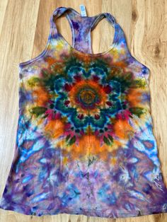 Women's medium racer back tankLotus Mandala Tank Top | Galaxy Ice Dye Shirt | Large Tank Top | Psychedelic Shirt | Yoga Tank Top | Festival Apparel | Trippy Hippie Shirt https://fullspectrumdyes.etsy.comUnisex tank top containing vibrant colors with intricate patterns and immense depth Multicolor Yoga Tops, Hippie Multicolor Tank Top For Festival, Stretch Multicolor Yoga Top, Multicolor Stretch Top For Yoga, Stretch Multicolor Top For Yoga, Casual Multicolor Tank Top For Yoga, Multicolor Racerback Summer Tops, Multicolor Racerback Top For Summer, Multicolor Stretch Racerback Tank Top