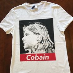 Kurt Cobain T-Shirts Men’s T-Shirts 2019 Licensed Shirts (Plz See Last Pic) 100% Cotton Limited Release And Completely Sold Out At Stores Sizes: S, M, L, Xl Posh Party Host Pick: 9-8-19 Price: Firm (No Offers Please) S: Armpit To Armpit Measures 19 1/2”; Top Of The Shoulder To Bottom Of T-Shirt Measures 27” M: Armpit To Armpit 21 Inches; Top Of The Shoulder To Bottom Of T-Shirt Measures 28” L: Armpit To Armpit 22 Inches; Length 29” Xl: Armpit To Armpit 24 Inches; Length: 30” H&m Relaxed Fit T-shirt With Graphic Print, H&m Relaxed Fit T-shirt For Streetwear, H&m Casual White T-shirt, White H&m T-shirt Crew Neck, H&m White Graphic Print T-shirt, H&m White Crew Neck T-shirt, H&m White Graphic Print Tops, H&m White Cotton T-shirt, H&m White Relaxed Fit T-shirt