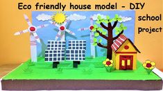 an eco friendly house model - diy school project with paper houses and windmills