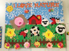 a bulletin board decorated with farm animals and flowers