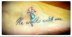 a foot with a tattoo on it that says, we walk with me