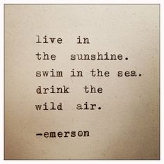 an old typewriter with the words live in the sunshine swim in the sea drink the wild air