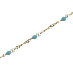 Elevate the joy of gifting for that special young girl in your life with our 18K Solid Yellow Gold Cultivated Pearls and Turquoise Paste Beads Bracelet. This meticulously crafted piece, made in Spain, exudes timeless elegance and charm. Designed with her comfort in mind, it's sized at 6.25 inches with an extra ring at 5.75 inches, ensuring a perfect fit for girls aged 3 and up.Crafted from hypoallergenic 18K yellow gold and free from lead and nickel, this bracelet prioritizes safety and style. I Elegant Turquoise Birthstone Bracelets, Turquoise Beaded Bracelet As A Gift, Elegant Single Strand Turquoise Bracelet, Turquoise Single Strand Bracelet Gift, Turquoise Single Strand Bracelet As Gift, Turquoise Single Strand Bracelet For Gift, Elegant Turquoise Beaded Chain Bracelet, Turquoise Bracelet With Polished Beads As Gift, Elegant Turquoise Pearl Bracelet For Gift