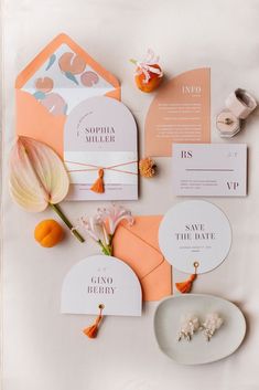 the wedding stationery was done in peach and white