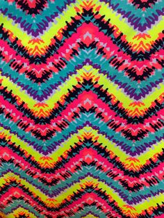 a colorful chevroned pattern on fabric