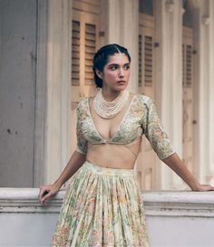 Featuring this deep neck blouse and lehenga in our signature yellow and orange floral print with hand embroidered details. It is embellished using baby flowers. The look is completed with an embroidered dupatta. Deep Neck Blouse, Printed Lehenga, 1950’s Fashion, Personal Shopping Service, Orange Floral Print, Baby Flower, Embroidered Dupatta, Orange Fabric, Embroidered Details