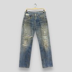 Size 30x31.5 Vintage 70s Levi's 501 Selvedge Stonewash Jeans 80s Levi's Faded Dirty Denim Levi's Distressed Jeans Levi's Redline Jeans W30 Please contact me for any questions about this clothing before buying. SIZE MEASUREMENTS :- WAIST : 30" inches HIPS : 43" inches THIGH: 24" inches  LEG OPENING : 16" inches RISE : 11" inches INSEAM : 31.5" inches OUTSEAM (TOTAL LENGTH) : 42" inches WEIGHT : 0.70 kg Condition : Distressed faded dirty jeans Good Vintage Conditions. Please pay close attention to Vintage Acid Wash Ripped Bottoms, Vintage Distressed Relaxed Fit Bottoms, Vintage Distressed Bottoms With Relaxed Fit, Vintage Distressed Relaxed Fit Jeans, Vintage Ripped Dark Wash Bottoms, Vintage High Rise Distressed Jeans, Retro Ripped Faded Jeans, Vintage Distressed Faded Jeans, Dirty Jeans