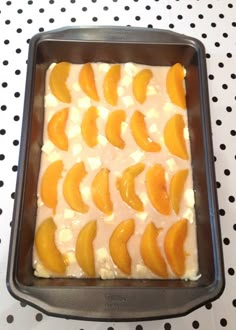 a pan filled with cake sitting on top of a table