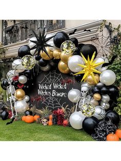 a halloween display with balloons and decorations