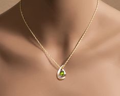 "14k Yellow Gold Pendant - Peridot and Diamonds - 3378 - Chain Not Included ( IMPORTANT - PLEASE READ 1. AND 2. BELOW ) 1.) DOES NOT INCLUDE A CHAIN: TO GIVE YOU MORE OPTIONS, A CHAIN IS NOT INCLUDED, BUT CAN BE PURCHASED SEPARATELY IN THE GOLD CHAINS SECTION OF OUR SHOP. http://www.etsy.com/shop/VerbenaPlaceJewelry?section_id=13811862 2.) PLEASE LOOK AT THE MEASUREMENTS CAREFULLY. SOME PHOTOS HAVE BEEN ENLARGED TO SHOW DETAIL, WHILE OTHERS HAVE BEEN MINIMIZED TO FIT THE FRAME. ACTUAL SIZE CANNO Gold Peridot Necklaces For Wedding, Yellow Gold Peridot Teardrop Jewelry, Elegant Peridot Birthstone Necklace, Peridot Necklace Pendant, Elegant Gold Peridot Birthstone Necklace, Handmade Peridot Pendant Jewelry, Peridot Gemstone Pendant Necklace, Gift Peridot Faceted Necklaces, 40th Anniversary Gifts