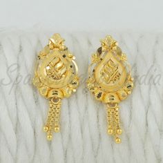 Celebrate the essence of Indian heritage with these radiant 22k gold earrings. Each earring is meticulously designed with traditional patterns that catch the light and add a regal touch to your look. Perfect for both festive occasions and elegant evenings, these earrings are a testament to the rich history of Indian jewelry, offering a blend of classic beauty and modern sophistication. 22k gold earrings handmade jewelry made in India Metal real gold, Purity 22k gold,  length is 2.4 centimeter an Festive 22k Yellow Gold Bridal Earrings, Festive 22k Yellow Gold Jhumkas, Elegant Gold Dual-tone Earrings, Elegant 22k Yellow Gold Danglers, Festive 22k Gold Bridal Earrings For Ceremonial Occasions, Elegant Dual-tone Gold Earrings, Yellow Gold Plated Bridal Earrings With Elegant Design, Ceremonial 22k Gold Bridal Earrings For Festive Occasions, Elegant Dual-tone Yellow Gold Earrings