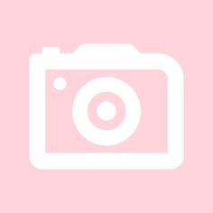 an image of a camera on a pink background