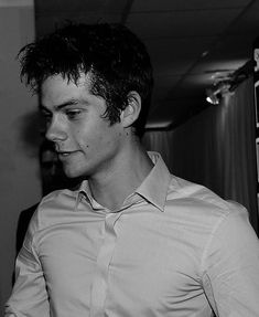 black and white photograph of a man wearing a shirt