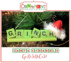 a christmas ornament that says grinch hanging from a pine tree with the word grinch on it