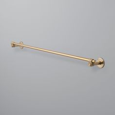 This towel rail is crafted from solid metal, showcasing a distinctive rough-cast knuckle and a hand-polished solid metal bar. Each knuckle is unique due to the casting process. With a durable brass PVD finish, this product is ideal for various interior spaces, including bathrooms. Clean only with mild dish soap diluted in warm water. Cleaning chemicals may damage the finish. All finishes are subject to aging Returns of this product will be subject to a manufacturer restocking fee. Please note, due to the durable EPL wet-rating treatment, the CAST brass differs slightly in appearance from the CROSS + LINEAR brass finishes. Specifications Material Brass finish: Brass 9-7/8" Width: 11-13/16" (300mm)Projection: 3-5/16" (84.5mm)Height: 2-1/4" (57.5mm)Center to Center: 9-7/8" (250mm)Plate Diamet Hardware Tape, Shower Door Handles, Bathroom Towel Rails, Buster Punch, Cookbook Holder, Lighting Gifts, Sliding Door Hardware, Liquid Hand Soap, Bath Hardware